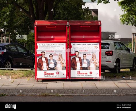 Emergency vehicles from the aid organization "Die Johanniter" pick up residents of a retirement home in Berlin, Germany, Saturday, Jan. 3, 2025, during a power cut in south-west Berlin after a fire on a cable bridge. (Michael Ukas/dpa via AP)
