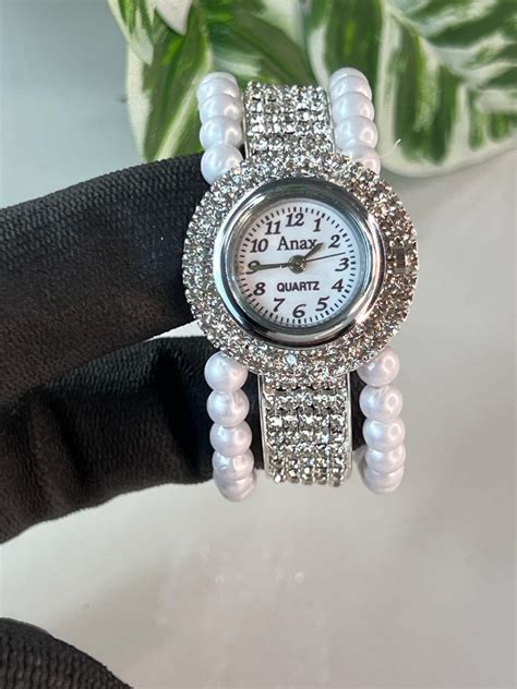 White Round Dial Stone Embedded Bracelet Style Watch For Women – World ...