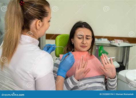 Woman Afraid before Dentisr Procedure and Covering Mouth Her Hands ...