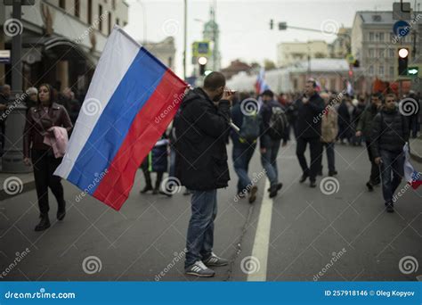 Moscow, Russia. 09 30 2022 Guy with Flag of Russia on Street of Moscow ...