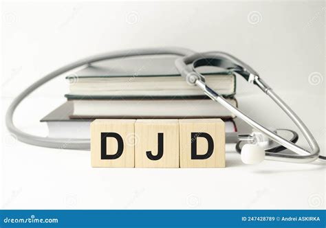 DJD Degenerative Joint Disease - Word from Wooden Blocks with Letters ...
