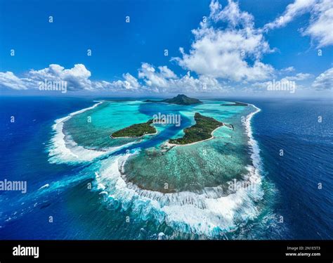 Aerial of the lagoon of Maupiti island, Society Islands, French ...