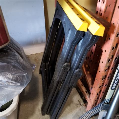 PAIR OF PLASTIC SAW HORSES