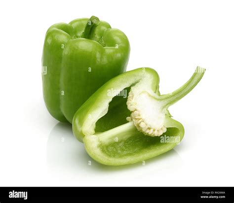 Green bell peppers isolated on white background Stock Photo - Alamy