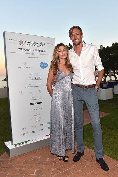 Abbey Clancy shines in a shimmering gown as she joins husband Peter ...