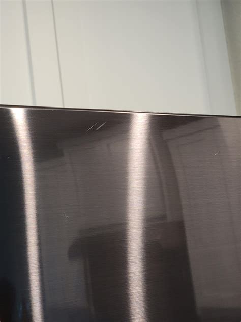 Delivery guys scratched my fridge. what do I do now? : r/Costco