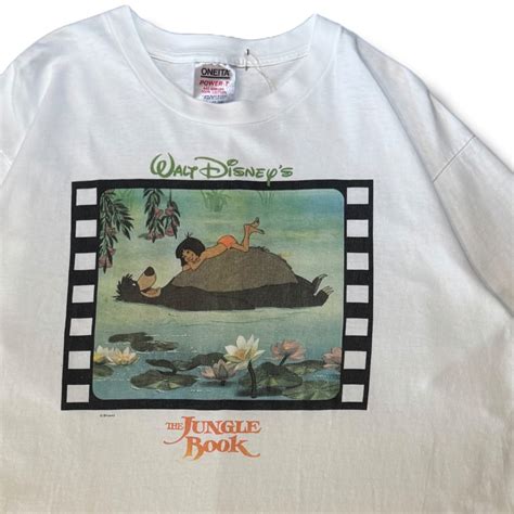 90s フィルムシリーズ ジャングルブックTシャツ | RIDDLE clothing