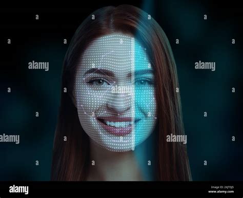 Facial recognition system. Scanning woman's face for authentication ...