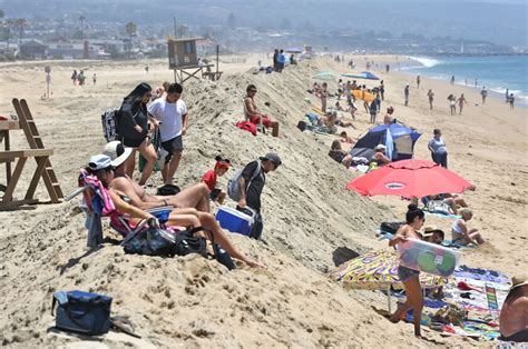 Newport Beach in cleanup mode after storm swell, high tide flood Balboa ...
