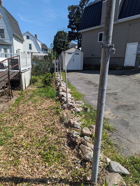 Using chain link fence posts for a wooden fence : r/FenceBuilding