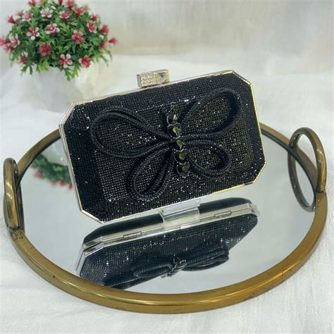 CAMELY CLUTCH – Treaso closet