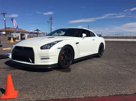 2014 Nissan GT-R Black Edition 1/4 mile Drag Racing timeslip specs 0-60 - DragTimes.com