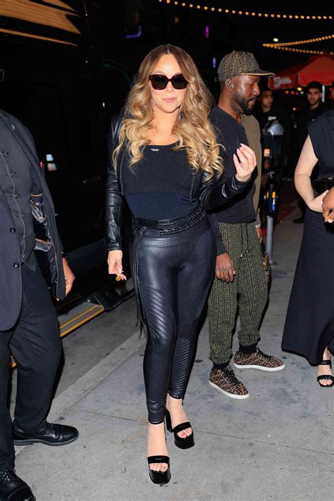 Mariah Carey Paired a Cropped Prada Logo Tank Top With the Tallest ...