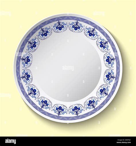 White porcelain or pottery plate with blue floral ornament. Stylized ...