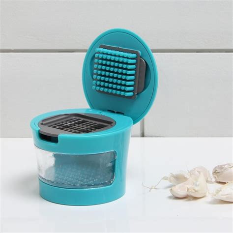 Buy Slice & Dice Garlic Press from Home Centre at just INR 349.0