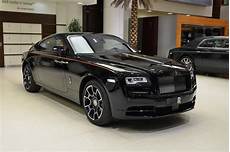 rolls royce black badge wraith rolls royce wraith black badge has a orangy interior rolls royce black badge wraith rolls royce wraith black badge has a orangy interior