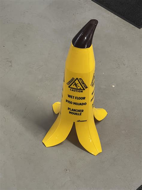 This wet floor cone shaped like a banana peel : r/bananawetfloorsign