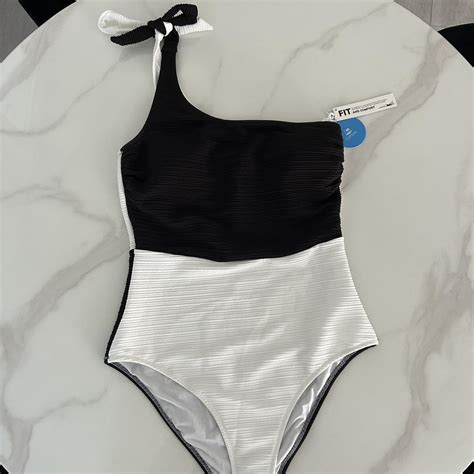 Black and white one piece bathing suit. Brand new... - Depop