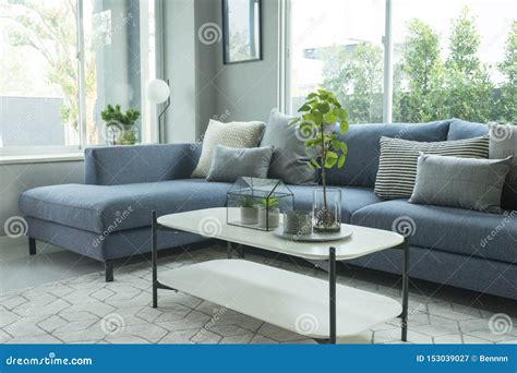Modern and Stylish Living Room, Blue Sofa and Grey Pillow with Coffee ...