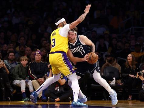 Davis, Russell take charge as Lakers spoil Doncic return for Mavs ...