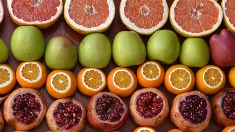 Download wallpaper 2560x1440 fruits, apples, pomegranates, oranges ...