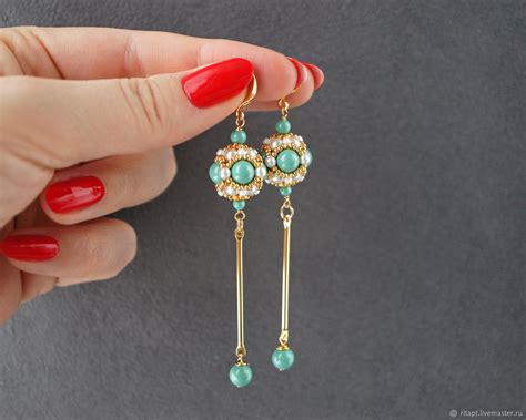 Серьги висячие с жемчугом Swarovski. Золотые серьги висюльки купить в ...