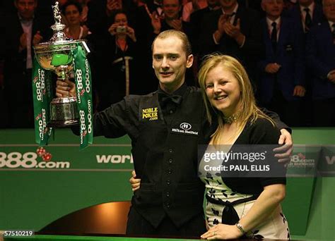 Graeme Dott celebrates with his wife Elaine after beating Peter Ebdon ...