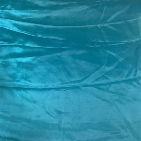 Buy Premium Dark Green Solid Liquid Organza Fabric Online at TradeUNO ...