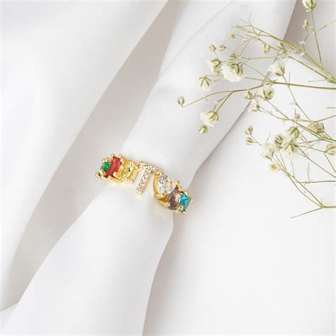 Joker & Witch Lowe Multicolour Alphabet T Ring For Women