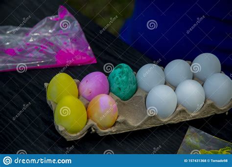Dying Easter Eggs stock photo. Image of beautiful, dyed - 157431368