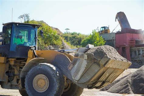 Image result for Backhoe Loading Logs
