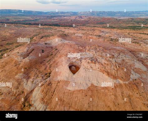 Photograph of the Cosmic Ashtray, a uniquely eroded sandstone formation ...