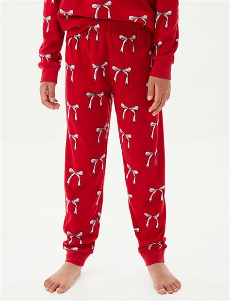 Buy Christmas Fleece Bow Pyjamas (1-16 Yrs) at Marks & Spencer