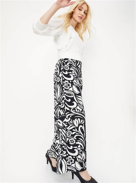 Buy Women Printed Wide Legged Trousers Online at just Rs. 999.0 ...