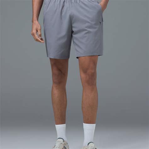 Men Solid Slim Fit Sports Shorts with TS FLEXI