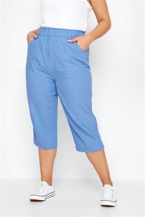 YOURS Plus Size Blue Elasticated Cool Cotton Cropped Trousers | Yours ...