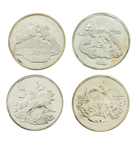 Lot - LOT OF 4 DANBURY MINT AMERICAN WILDLIFE STERLING SILVER PROOF ART ...