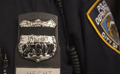 Mourning the Fallen: Police Wear Bands for Slain NYPD Officers - Newsweek