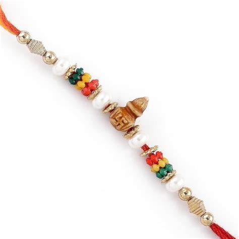 Swastik Kalash & Pearls Mauli Thread Rakhi : Amazon.in
