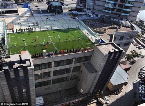 Football pitch constructed on the roof of a high rise shopping mall in ...