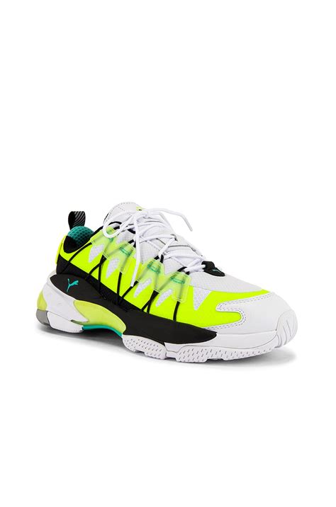 Puma Select LQD Cell Omega Lab in White & Yellow Alert | FWRD