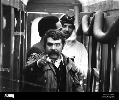 GEORGE P COSMATOS DIRECTING THE CASSANDRA CROSSING Stock Photo - Alamy