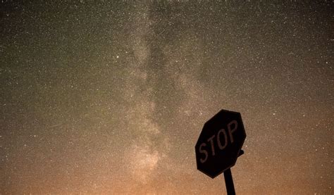 Download wallpaper 1024x600 sign, stop, milky way, night netbook ...