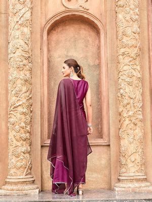 Burgundy color silk blend with white thread embroidered kurta & palazz