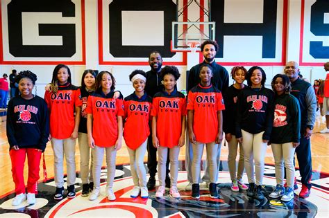 Photos: Jeremiah Robinson-Earl and his father gift basketball shoes to ...