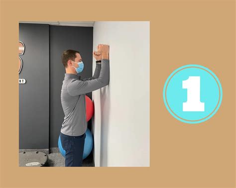Shoulder Exercise- Wall Slide - SOS Physiotherapy