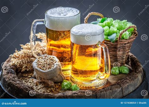 Two Fresh Pint of Beers on Wooden Barrel Stock Photo - Image of drink ...