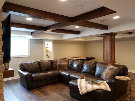 Finished basement, wood beams, LVP floor, custom design | Wood beams ...