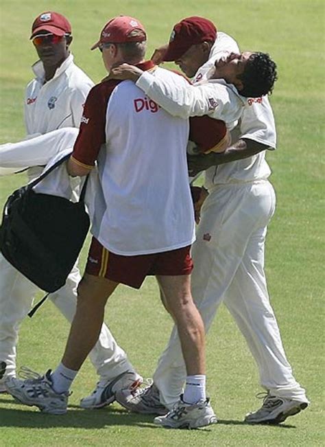 Ramnaresh Sarwan is carried off after getting hit on the knee ...