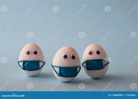 Eggs Wearing Medical Mask for Stop Coronavirus S on Blue Background ...